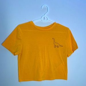 Yellow crop top with dinosaur print
